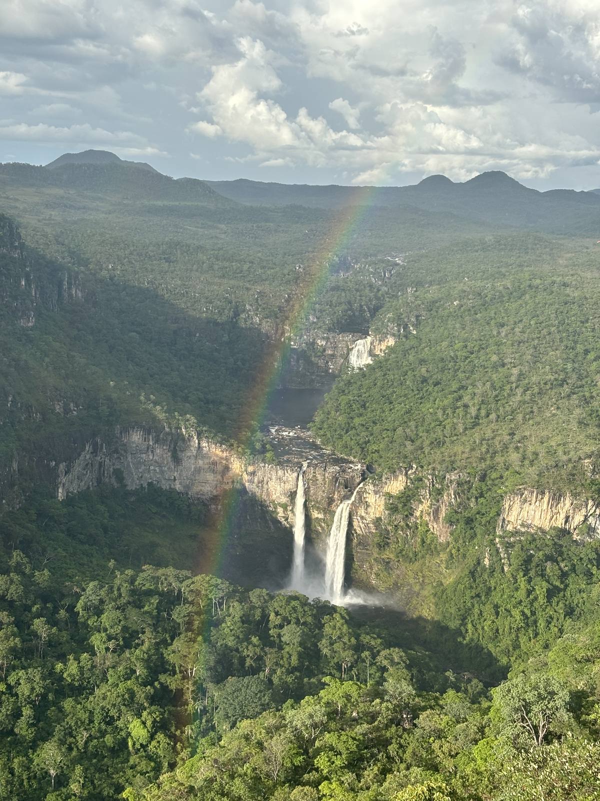 Saltos do Rio Preto with a rainbow over the falls