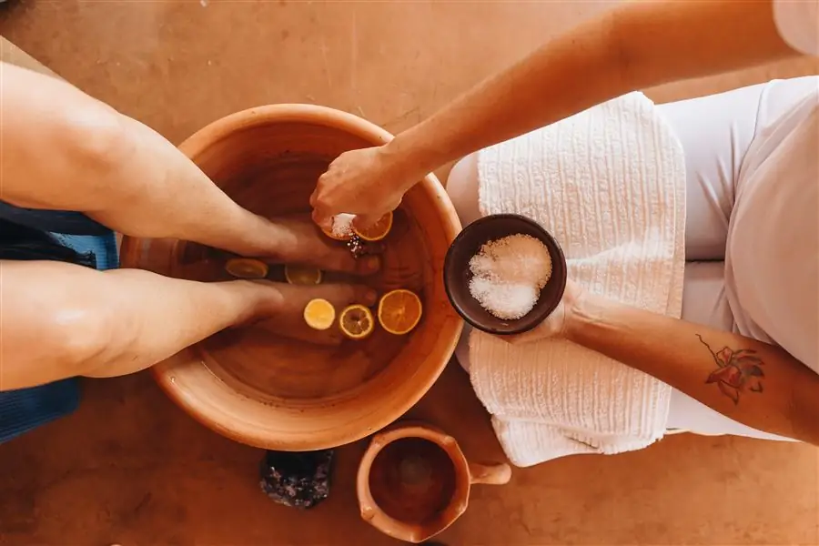 Foot bath ritual with citrus and salt scrub